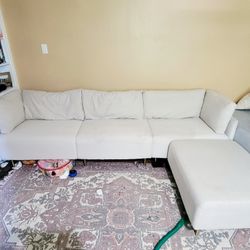 Wide modular sofa with ottoman