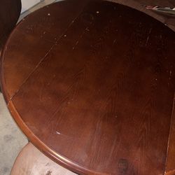 Round wood table with 4 wood stackable chairs