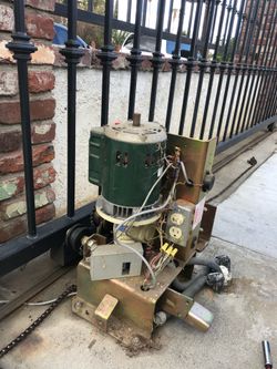 Electric gate shaking, dragging, or jamming? I fix chain, rollers, and tracks