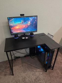 L-Shaped Desk with Outlets + Gaming Chair