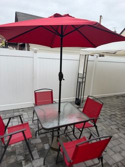 Outdoor Table & Chairs & Umbrella (Used) In Good Condition $50