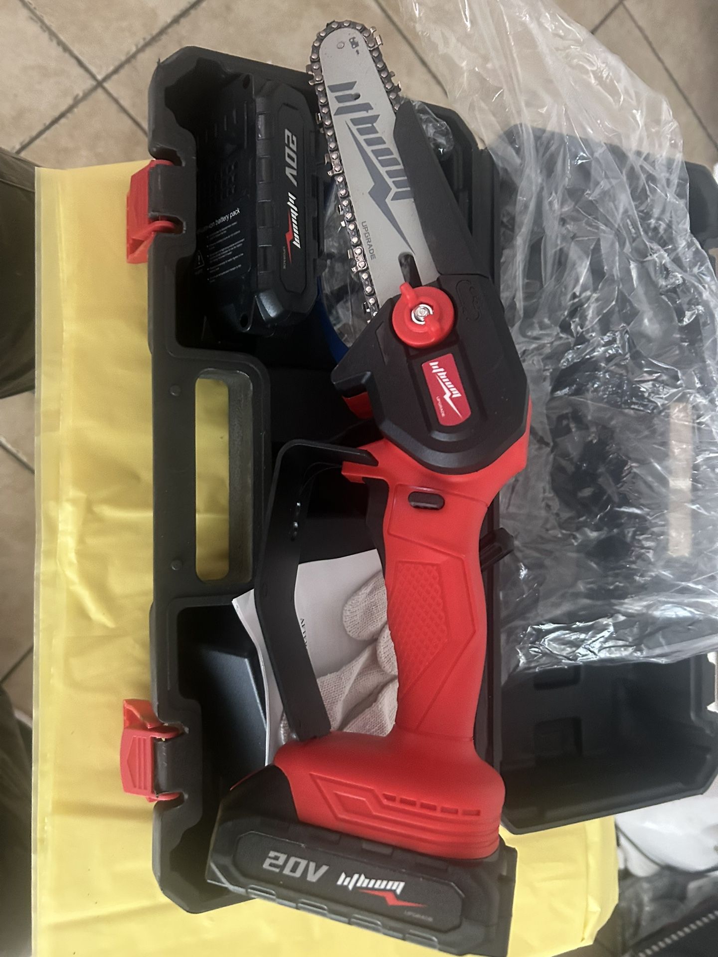 6 inch lithium chainsaw. It comes with two batteries, safety gloves, and safety goggles.