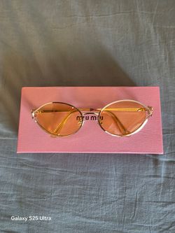 Yellow miu miu glasses