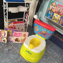 Potty Seat and a Book Rack Toilet Paper Roll Holder