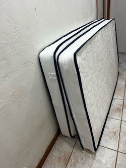 2 Almost new twin mattresses