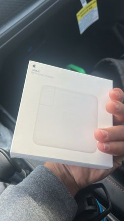 Unopened apple power adapter  brand new with reciept