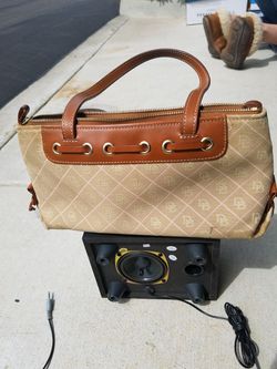 Well used Dooney and Bourke hand bag