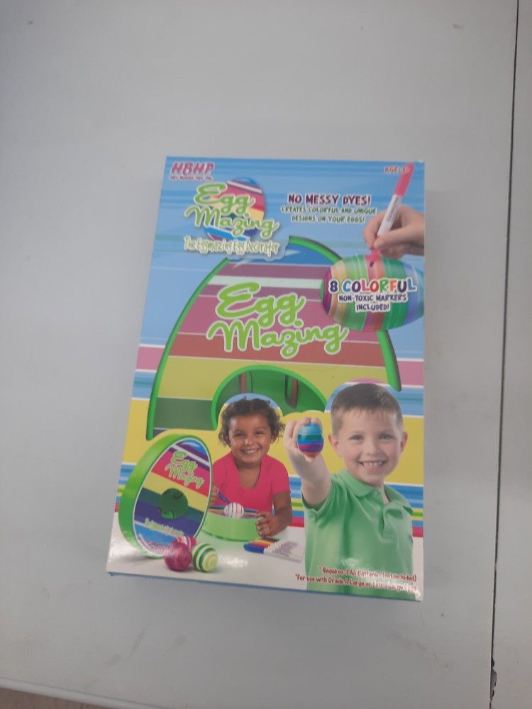 The Original EggMazing Easter Egg Decorator Kit - Arts and Crafts Set - Includes Egg Decorating Spinner and 8 Colorful Quick Drying Non Toxic Markers