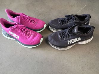 The 2 pairs of shoes HOKA