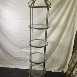 Beautiful four tiered gold round display shelf