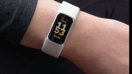 Fitbit charge 6  with lunar white band tracks sleep, heart rate exercise and fitness smartwatch tracker