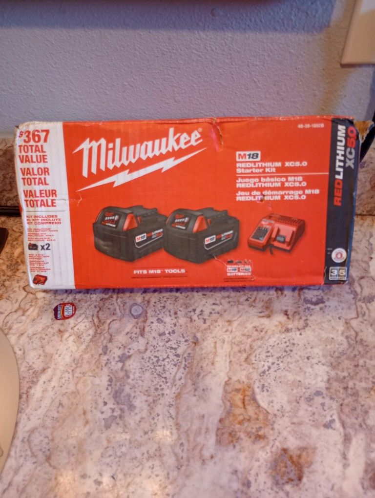 2-Pack New Milwaukee M18 Batteries and Charger