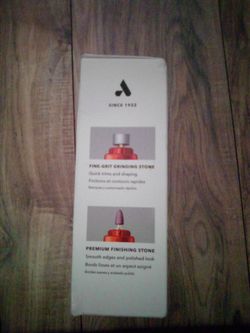 Quiet pet nail care with sanding wheel & finishing stone