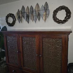 70" Size  Huge  Tv Intertaiment  Brown  With Real  Wood  With  Metal Venner  Asking $225 Obo.