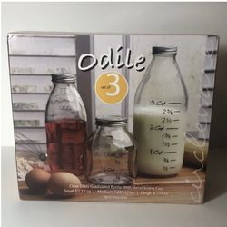 New in box 3 glass bottles with measurements