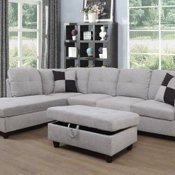 New white grey sectional and ottoman 