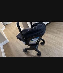 Evenflo Shyft DualRide Infant Car Seat Stroller Combo with Carryall Storage (Boone Gray)