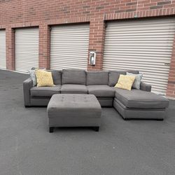 really nice gray sectional couch with ottoman