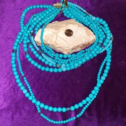 9 Strand Turquoise Colored Necklace 