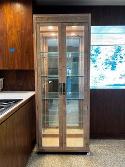 Beautiful Glass cabinet with adjustable shelves
