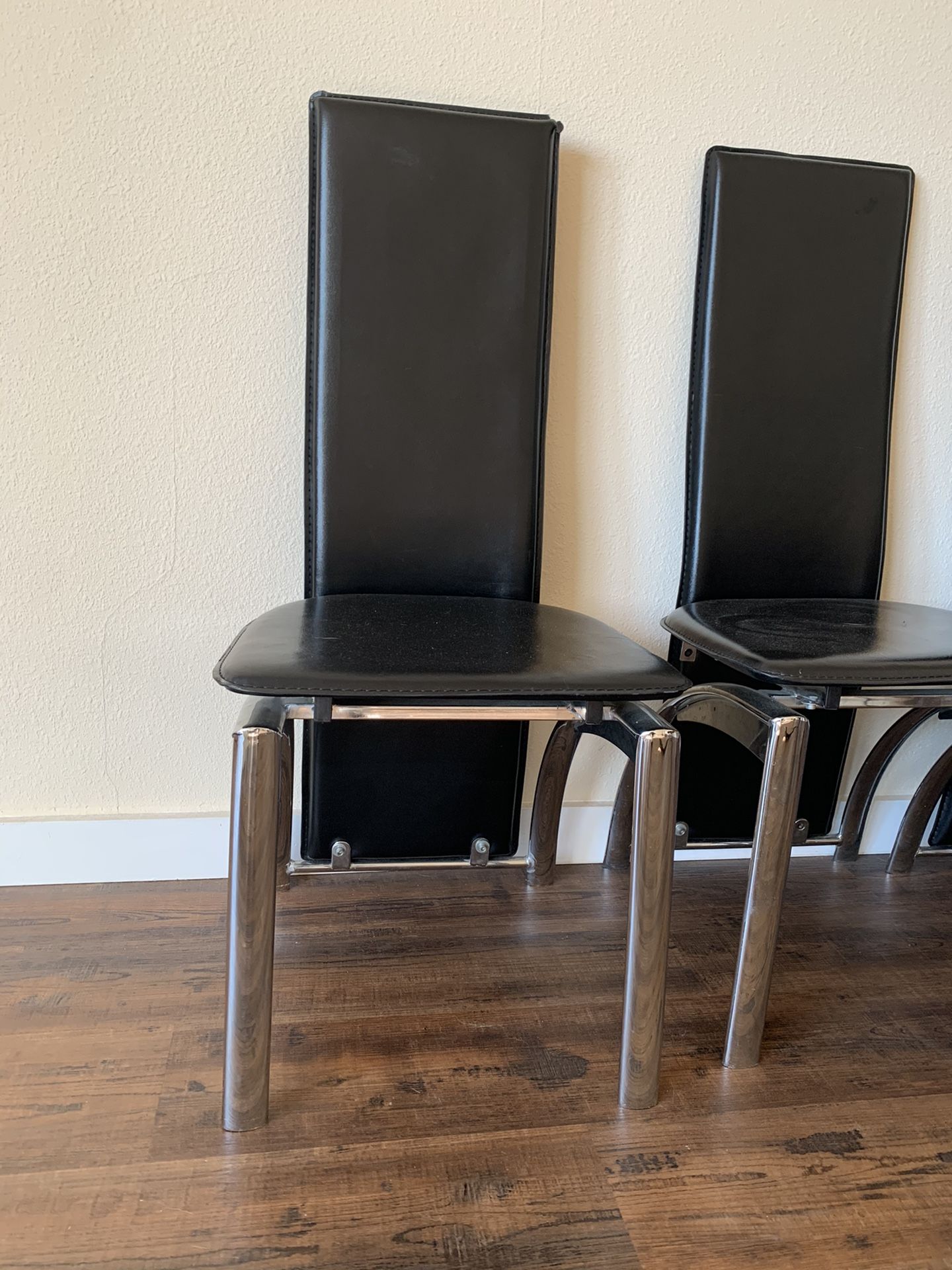 Kitchen chairs. black and chrome. chairs only. There are only three chairs. Pick up downtown. Best offer
