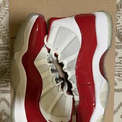 Jordan 11 “Cherry” size(12M). Preowned in Great condition. Comes with no box.