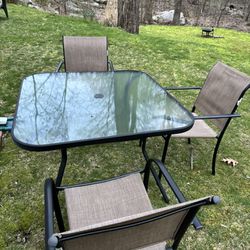 3 Chairs With A Table