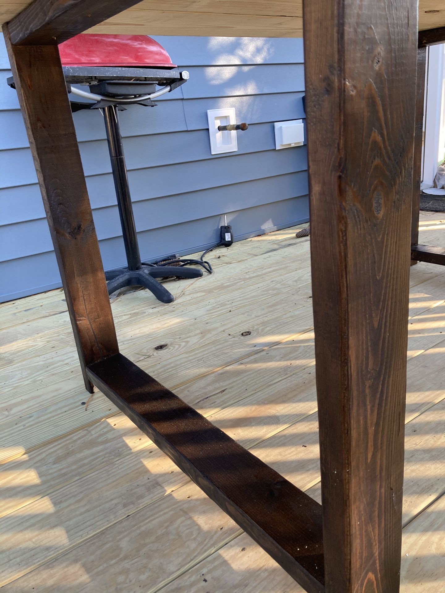 Inside/ outside weather treated wood table