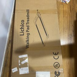 BRAND NEW TREADMILL WALKING PAD 