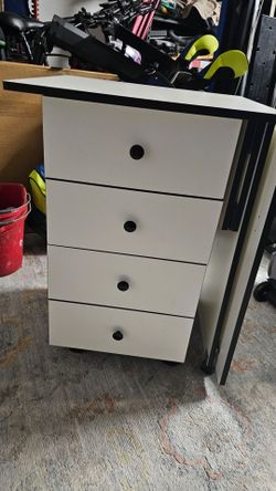New expandable cabinet with leaf extension.  Four drawers and expandable top.