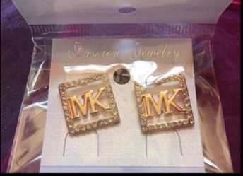 Brand new MK earrings gold plated