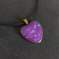 Purple faux opal glow in the dark heart pendant on black cord necklace new 