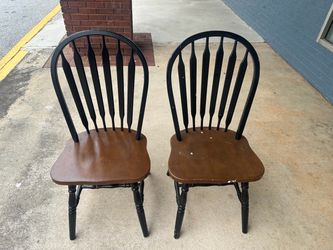 Set of two wooden dining room chairs