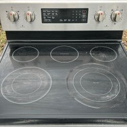 Beautiful Stainless Steel And Black Glass Top Stove