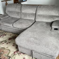 Sectional couch with bed and storage