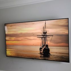 Samsung 65 inch full array 4k TV with a wall mount