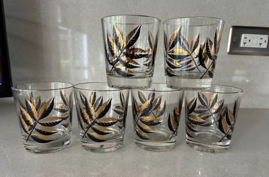 Six vintage gold and black old-fashioned glasses