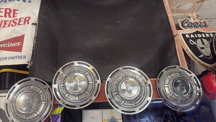1959 tru 1962  14inch impala hubcaps