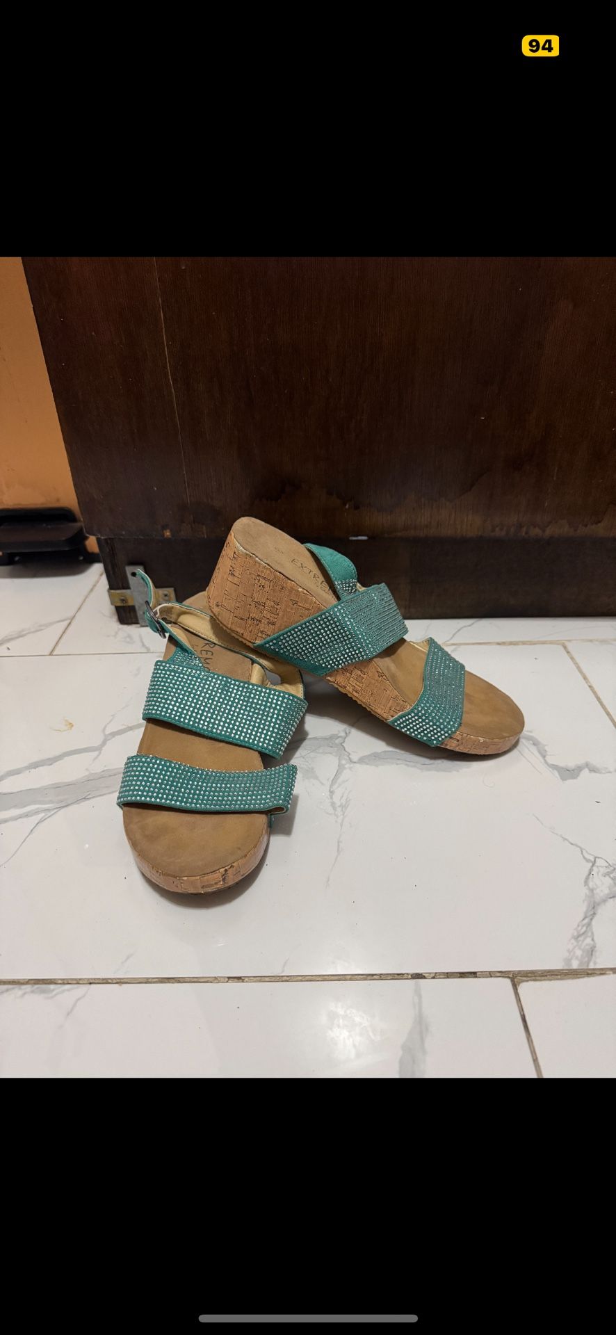 Extreme by Eddie M Teal Rhinestone Wedge Sandals Description: Stylish teal wedge sandals from Extreme by Eddie M, featuring a cork wedge sole and da