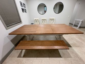 Extendable reclaimed wood dining table