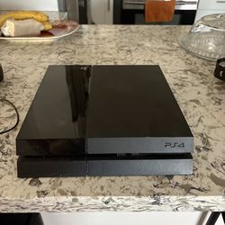 PS4 plus two gaming headsets