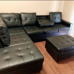 Heights Black Faux Leather Reversible Sectional with Storage Ottoman