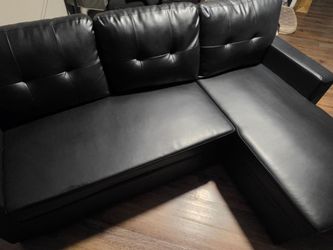 Black Faux Leather Sleeper Sectional with Storage Chaise