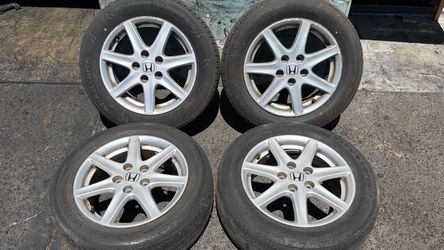 Honda 16 Inch aluminum wheels with two good tires Fits Civic Accord Acura