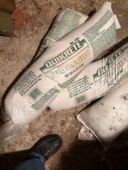 Four 60 lb sand bags