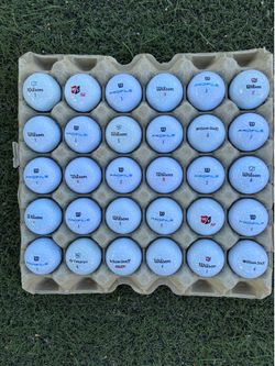 30 golf ⛳️ balls Wilson