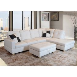 New White Leather Sectional And Ottoman