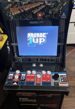 1up asteroids deluxe arcade machine