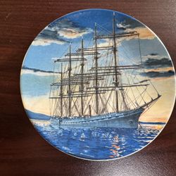 Vintage collector plate featuring a painting of the French sailing vessel "France II" by artist P.A. Bate. 