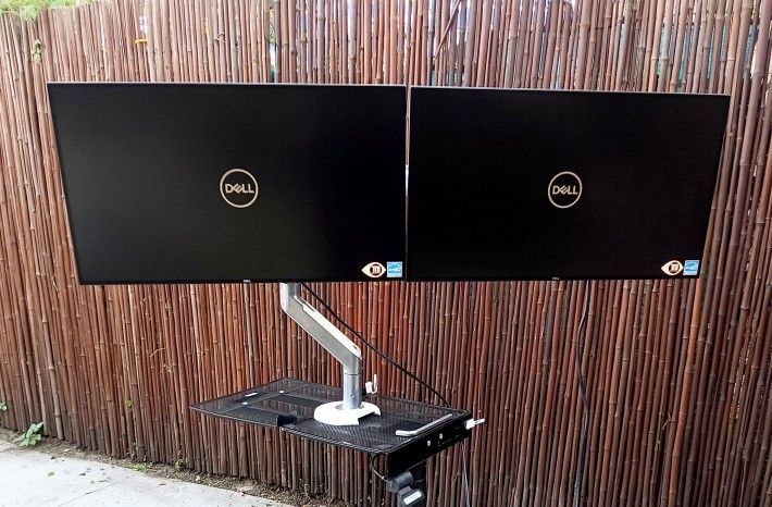 Two Dell 27" UltraSharp U2719D Monitors With Humanscale M8.1 Adjustable Dual Monitor Arm